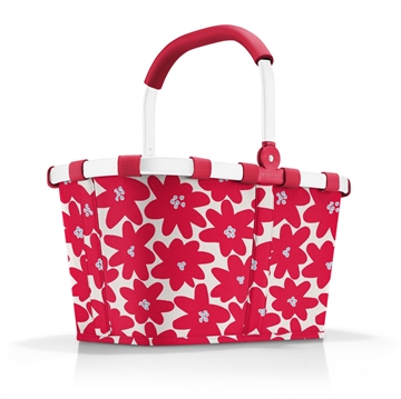 Blomstret indkøbskurv med rødt gummihåndtag på bærehanken